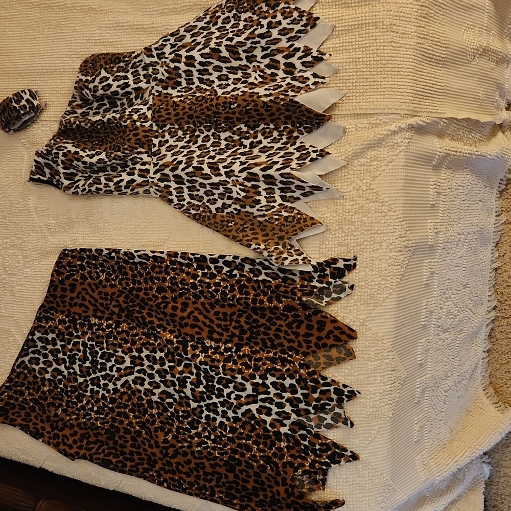 Pair of cave people costumes small/medium
